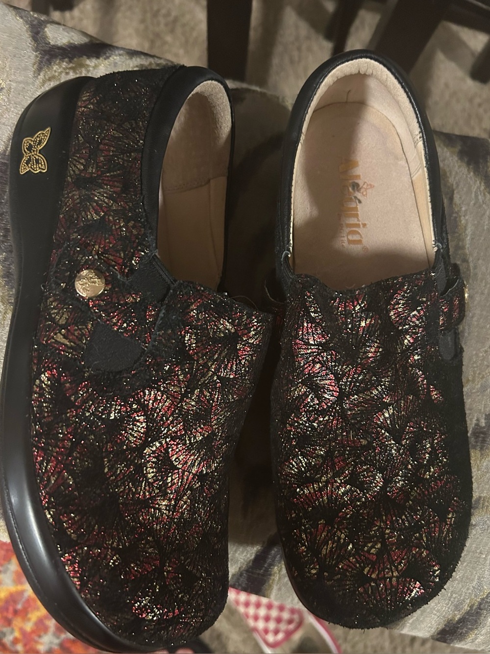 Alegria Black Slip-On Clogs with Metallic Red and Gold Overlay